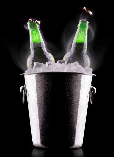 Beer bottles in ice bucket