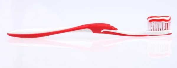 Red and white Toothbrush