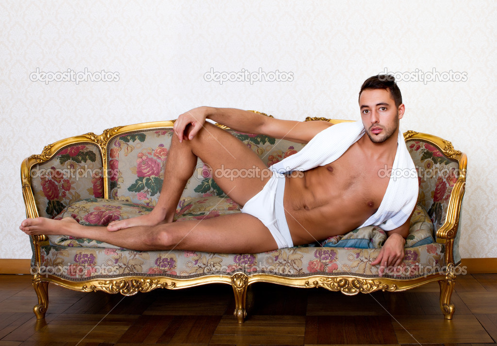 [Image: depositphotos_19825885-man-model-couching-on-sofa.jpg]