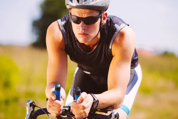Triathlete cycling on a bicycle