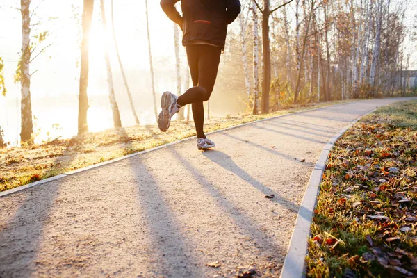 Man running at sunrise