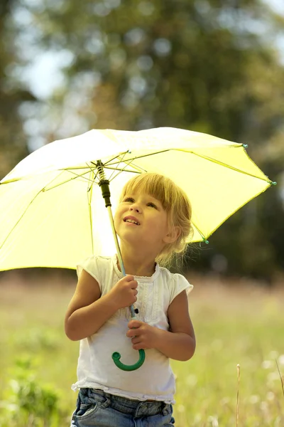 Beautiful little girl with umbrella outdoors — Stock Image 13831954
