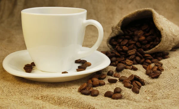 Coffee mug and coffee beans