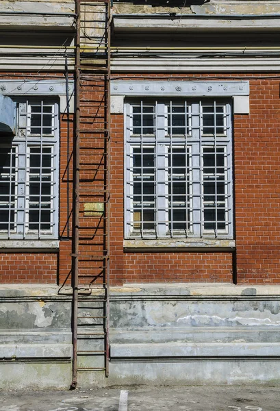 Old building fire escape ladder