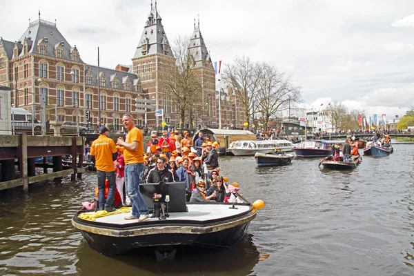 AMSTERDAM, NETHERLANDS - APRIL 30: in orange celebrating