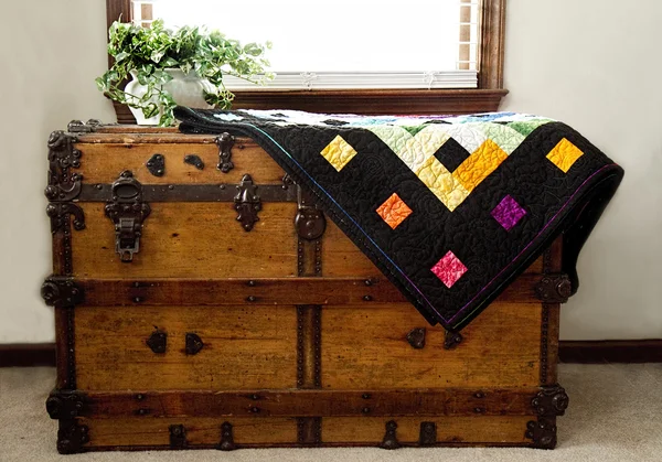 Home-made Quilt on Antique Chest