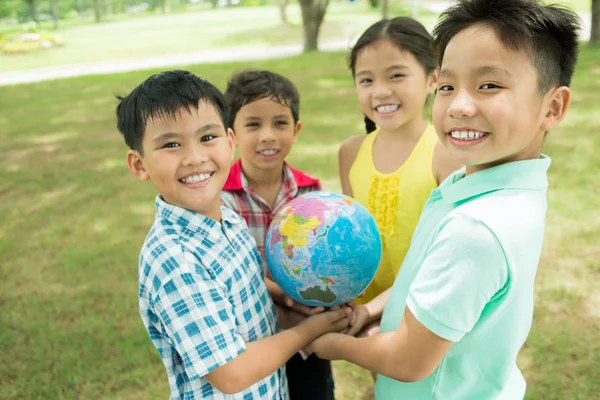 Kids with globe