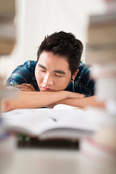 Exhausted student sleeping