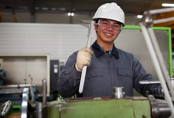 Asian male industrial mechanic
