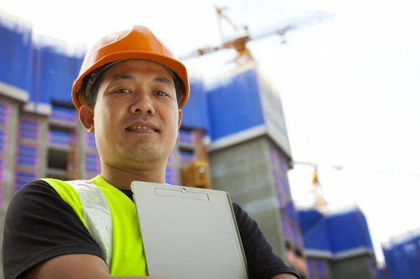 Portrait of asian builder