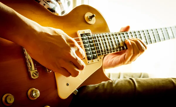 Man playing electric guitar