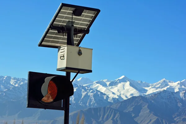 Traffic light and solar cell panel in Leh, Ladakh, India.