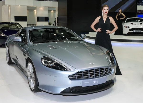 Female presenters model at ASTON MARTIN Booth.