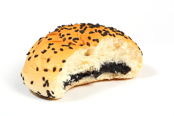 Bitten sandwich bun with black sesame seeds