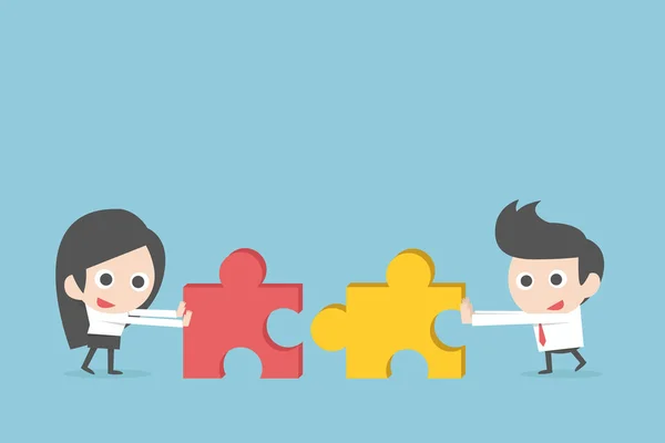 Business teamwork with jigsaw