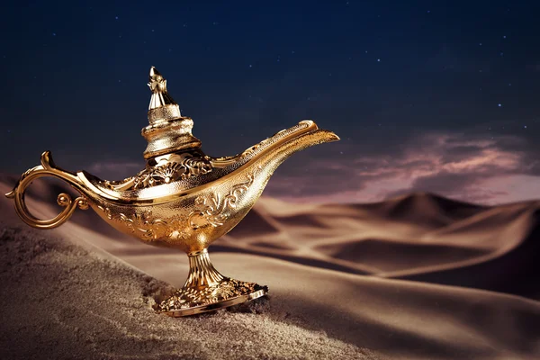 http://st.depositphotos.com/1653909/1344/i/450/depositphotos_13447182-Magic-Aladdins-Genie-lamp-on-a-desert.jpg