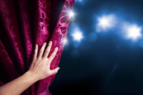 Theater curtain with dramatic lighting