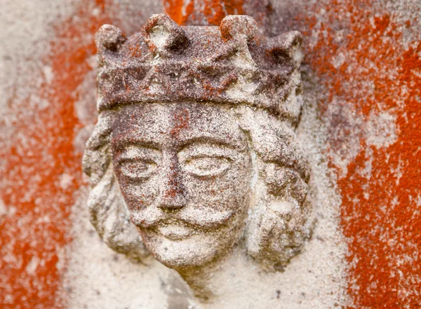 Old King Sculpture on a Gravestone