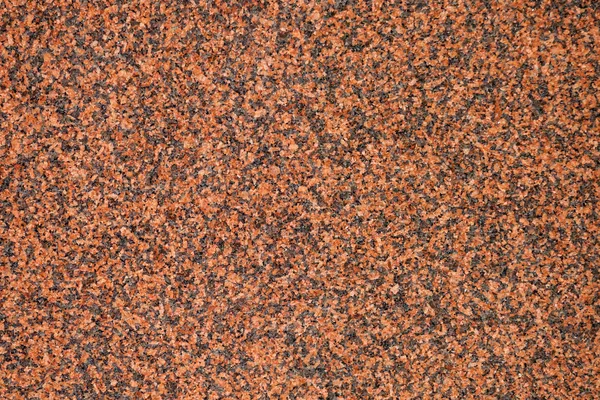 Granular texture of a Slab of Red Polished Granite
