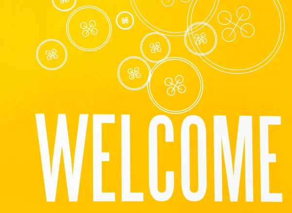 Yellow and White Sign with Word WELCOME and  Button Design