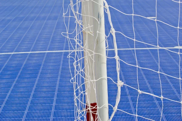 White football net, green grass ,futsal goal