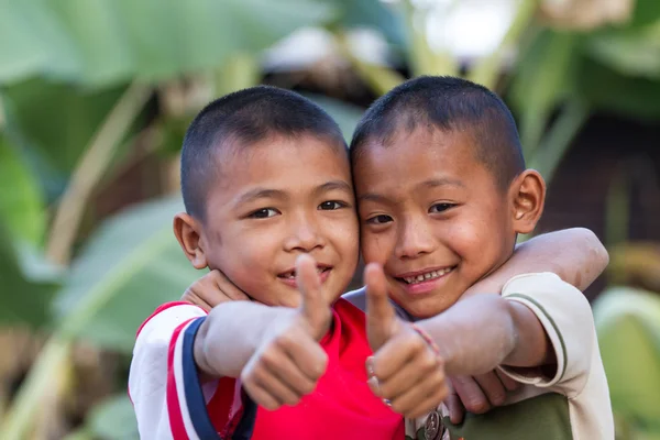 Two little friends hugging each other