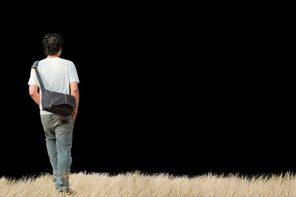 Young man walking alone