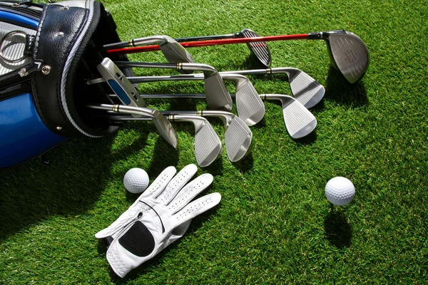 Golf glove,ball and clubs in bag