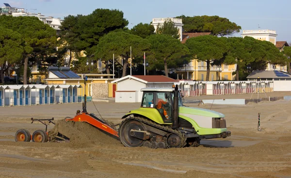 Bulldozer at Work on a Beach
