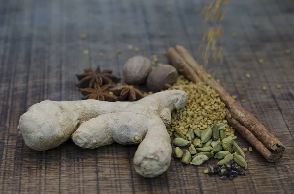 Fenugreek seeds, tumbling onto other ayurveda spices