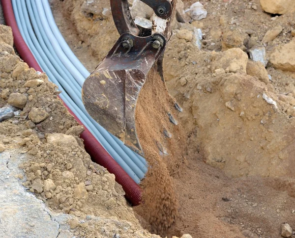 Excavator electrical conduits