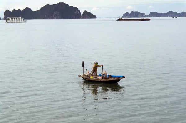 Fishermen Family on the Boat in Ha Long Bay.