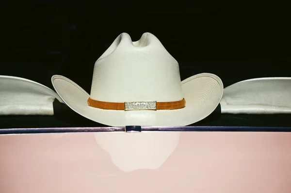 Cowboy hat on window, vintage style