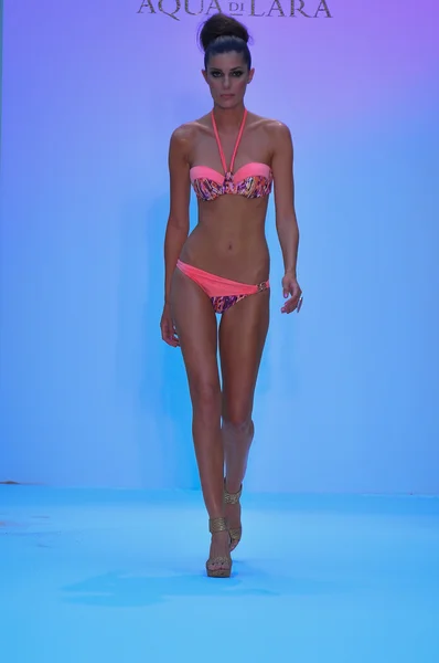 MIAMI - JULY 21: Model walks runway at the Agua di Lara Swim Collection for Spring Summer 2013 during Mercedes-Benz Swim Fashion Week on July 21, 2012 in Miami, FL