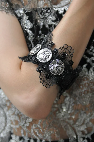 Retro style woman wearing designer bracelet