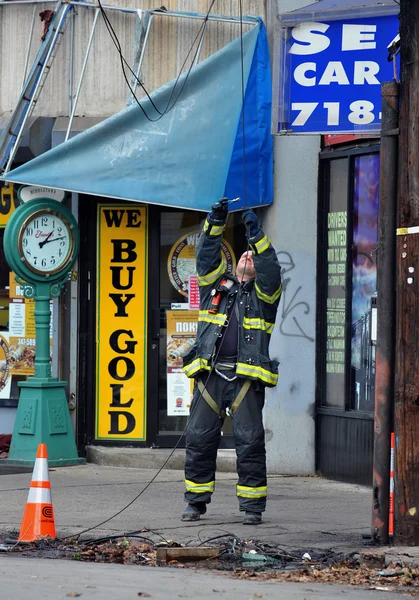 BROOKLYN, NY - NOVEMBER 01: NYFD fixing electrical wires at the Brighton Beach neighborhood due to impact from Hurricane Sandy in Brooklyn, New York, U.S., on Thursday, November 01, 2012.