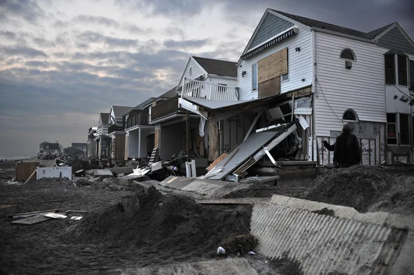QUEENS, NY - NOVEMBER 11: Damaged houses without power at night in the Rockaway beach - Bel Harbor area due to impact from Hurricane Sandy in Queens, New York, U.S., on November 11, 2012.