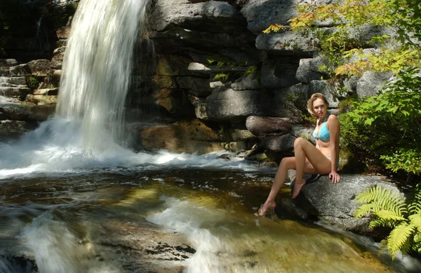 Sexy female model posses in and around waterfalls at Kaatskils mountains upstate NY