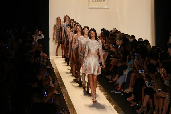 A models walks the runway at the Herve Leger By Max Azria Spring 2013 fashion show