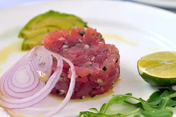 Tuna tartar and mango with a micro green salad