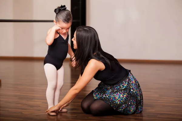 Instructor comforting a student