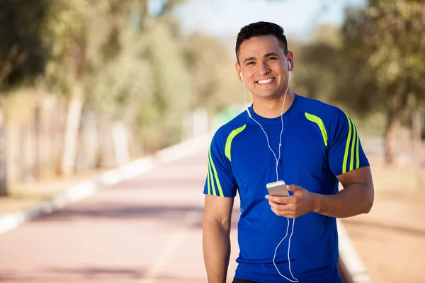 Happy runner listening to music