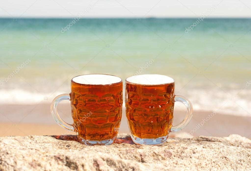 depositphotos_13620611-stock-photo-two-glasses-of-cold-beer.jpg