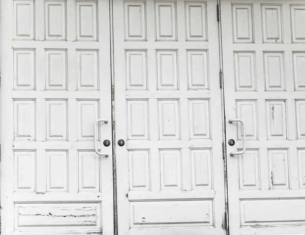 Closed white doors
