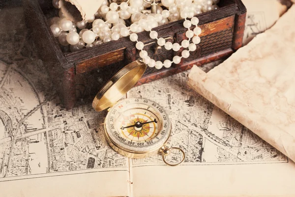 Treasure chest, compass and old map