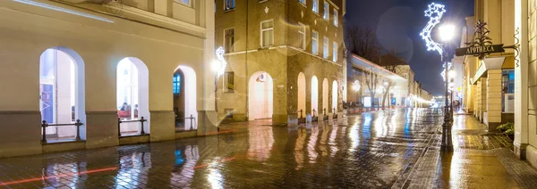 Street view at night in Klaipeda, Lithuania.