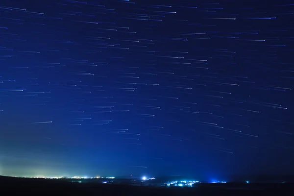 Star trails over the suburbs