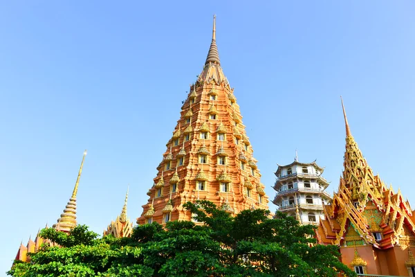 Delicated golden pagoda on the hill