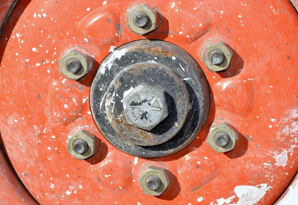 Wheel rim on old excavator close up