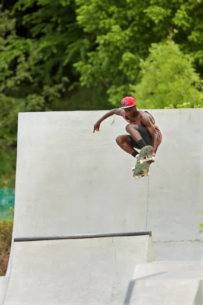 Teen Catches Big Air Skateboarding Off Concrete Ramp